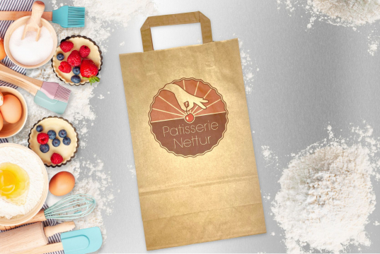 Papperspåsar med platta handtag | Kuvertland.se