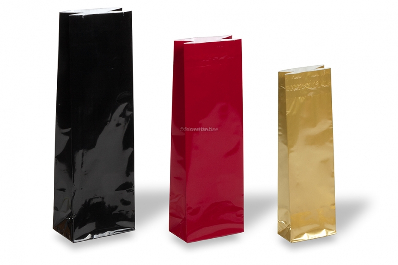 Färgade papperspåsar med stadig botten